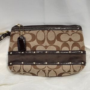 Coach Signature Canvas Jacquared Monogram C Wristlet in Brown/Tan.